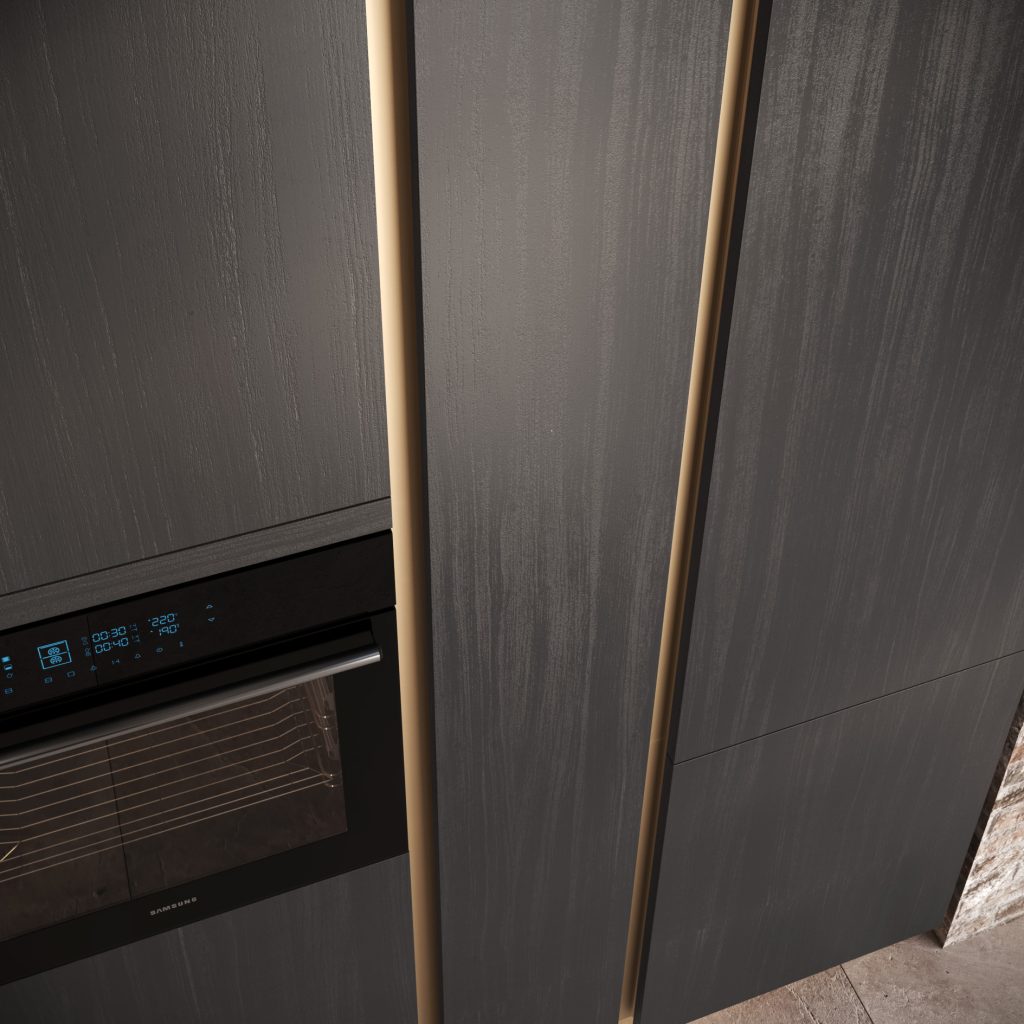 Dettaglio ravvicinato delle ante rovere scuro con gola champagne e forno della cucina Modern & Design Ginevra di Ciao Cucine, stile industrial