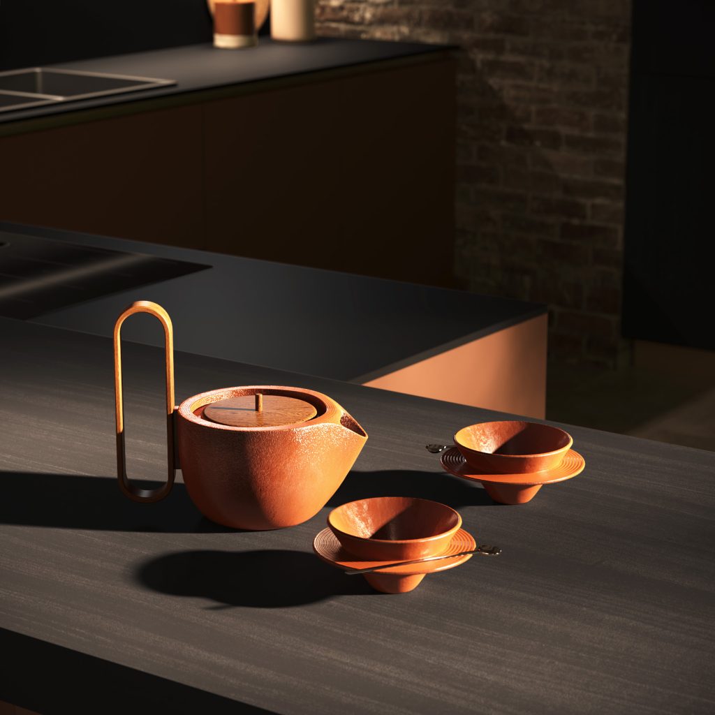 Dettaglio still-life con teiera e ciotole terracotta sul piano della cucina Modern & Design Ginevra di Ciao Cucine, ambiente rovere scuro e mattoni industrial