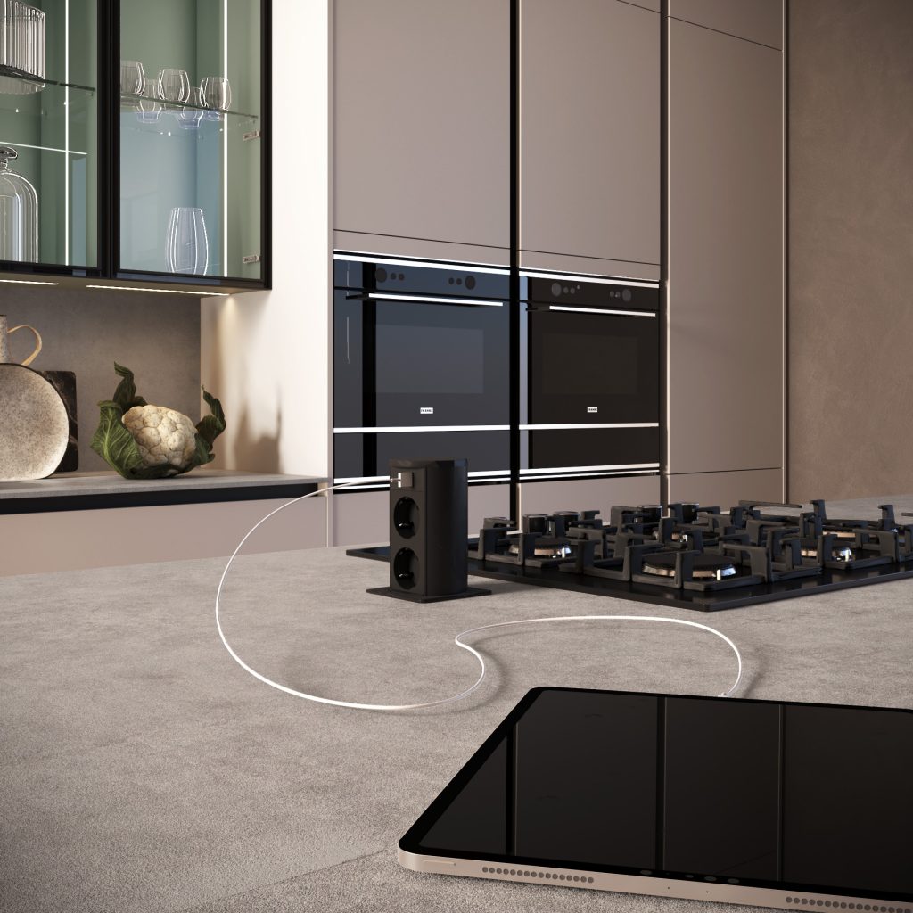 Torretta presa a scomparsa e piano cottura a gas su top pietra, dettaglio della cucina Modern & Design Marilyn di Ciao Cucine