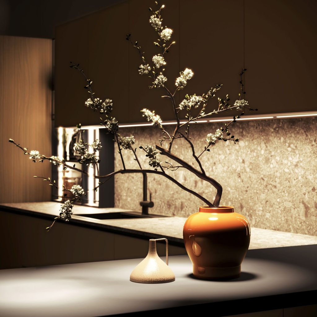 Cucina moderna economica Melania di Ciao Cucine, dettaglio con vaso arancio e ramo fiorito su piano effetto pietra, atmosfera serale